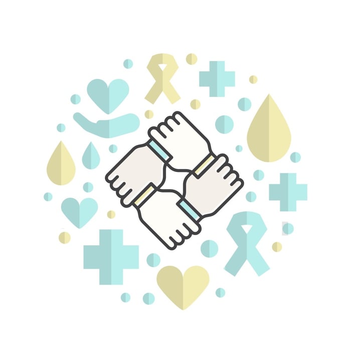Illustration of four interlocked hands surrounded by health and wellness icons, symbolizing unity, support, and community care — representing the mission-driven conclusion of FQHC medical website development.