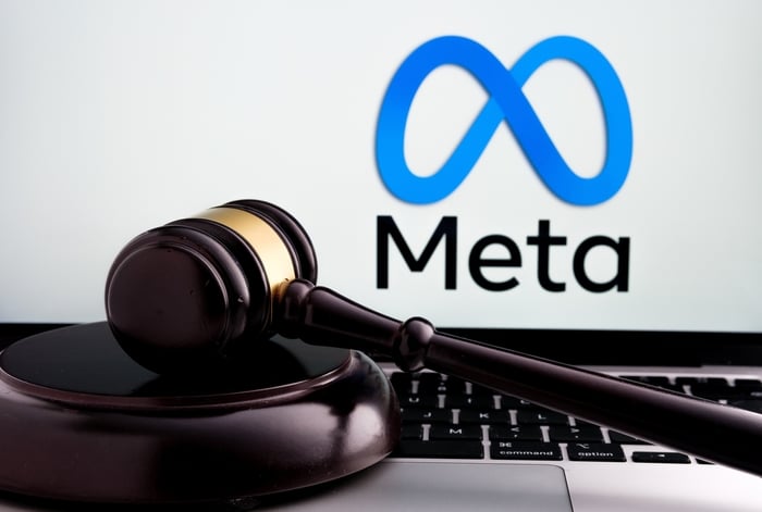 Judge’s gavel on a laptop keyboard with Meta logo in the background, representing the Flo Health–Meta data privacy case and its legal implications.