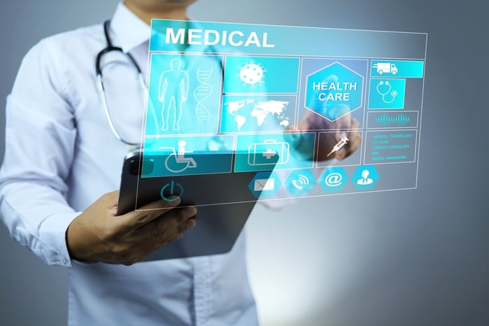Doctor holding a tablet