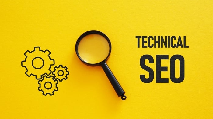 Magnifying glass and gear icons on a bright yellow background symbolizing Technical SEO — the behind-the-scenes optimization that powers website speed, security, and performance for doctors’ medical practice websites.