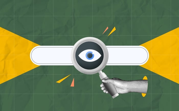 Magnifying glass with an eye symbol examining a search bar, representing the importance of understanding patient needs and improving visibility in medical website design.