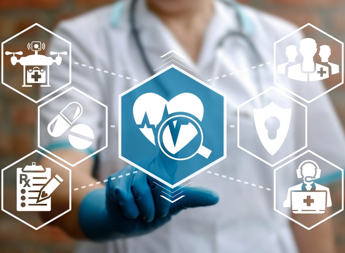 Doctor pressing a digital "Assurance" button, symbolizing trust, protection, and compliance in modern healthcare environments—ideal for reinforcing the conclusion on secure, HIPAA-compliant growth.